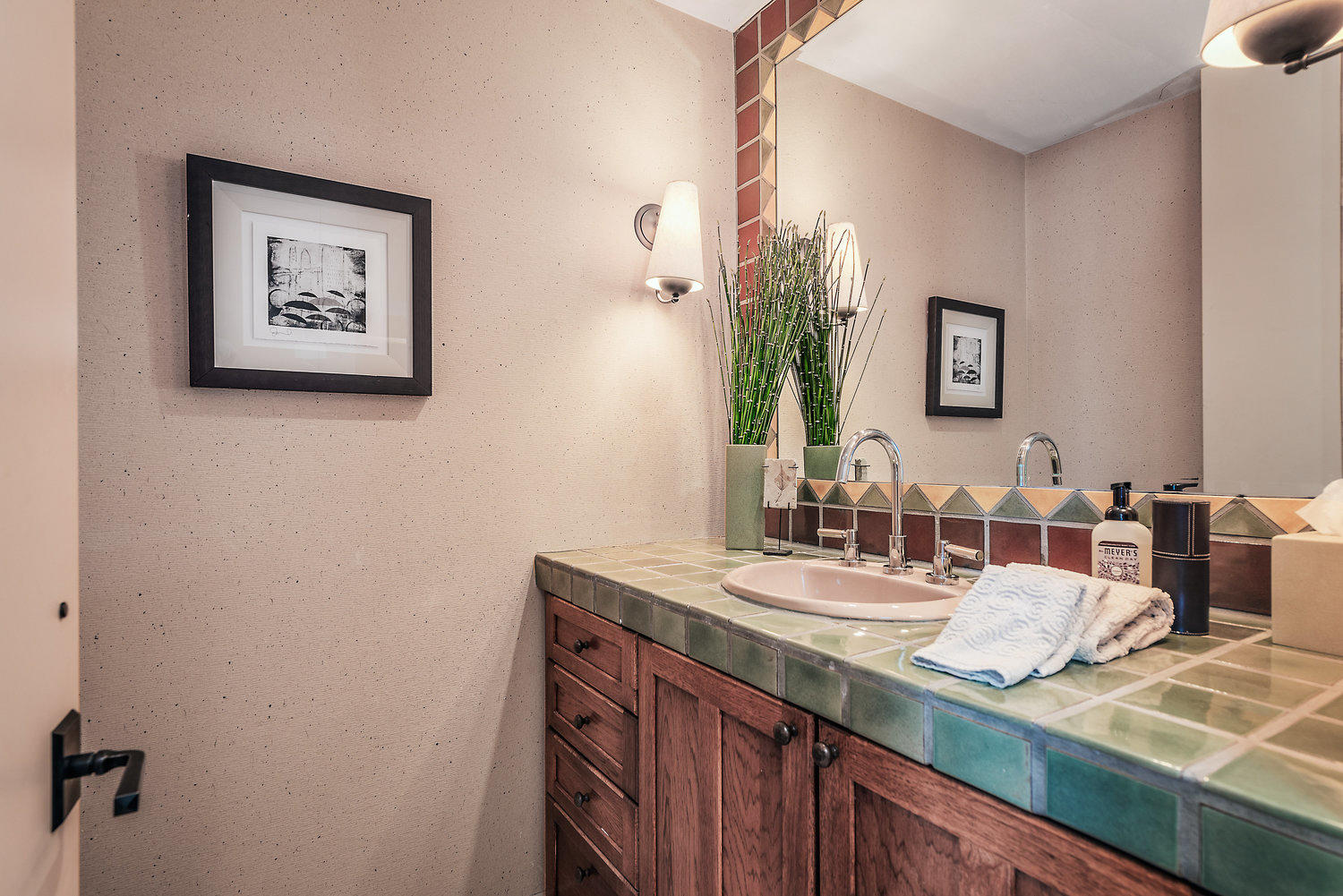 73580 Broken Arrow Trail Palm Desert, CA 92260 - Photo 35 of 40 a bathroom with a granite countertop sink a toilet and a mirror