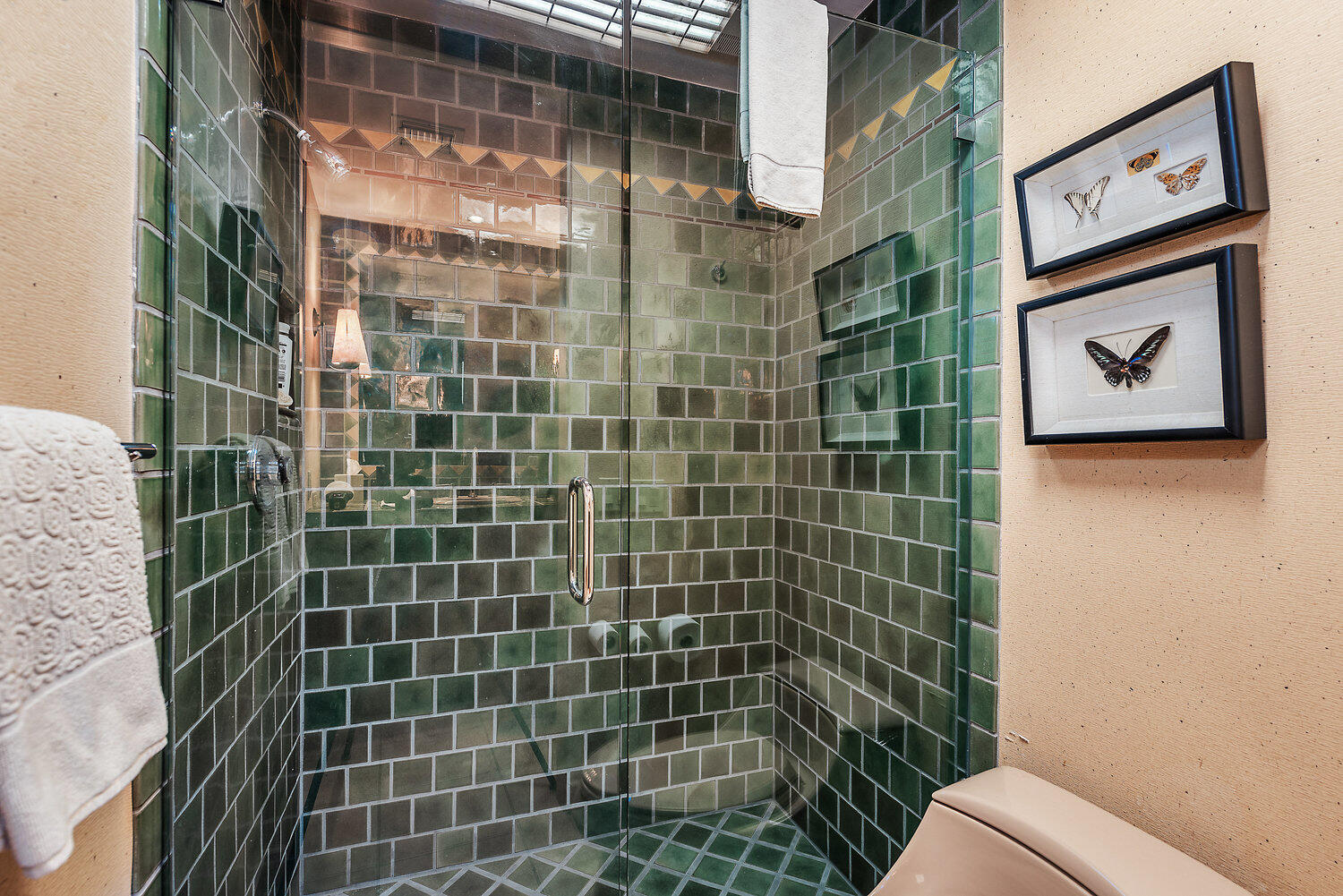 73580 Broken Arrow Trail Palm Desert, CA 92260 - Photo 36 of 40 a bathroom with a toilet sink and shower