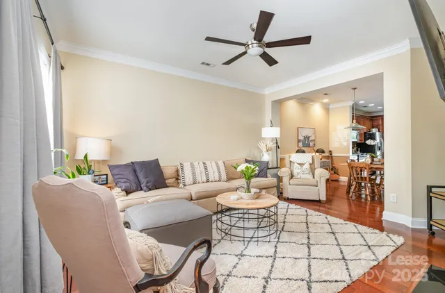 a living room with furniture and a rug