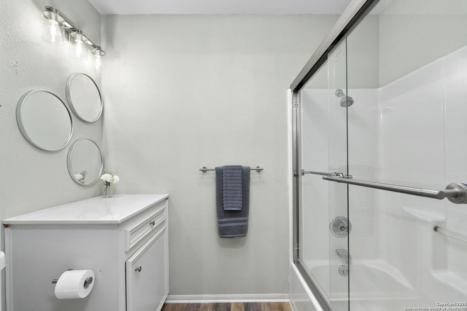 668 Indian Mound Road Tarpley, TX 78883 - Photo 39 of 50 a bathroom with a sink and mirror