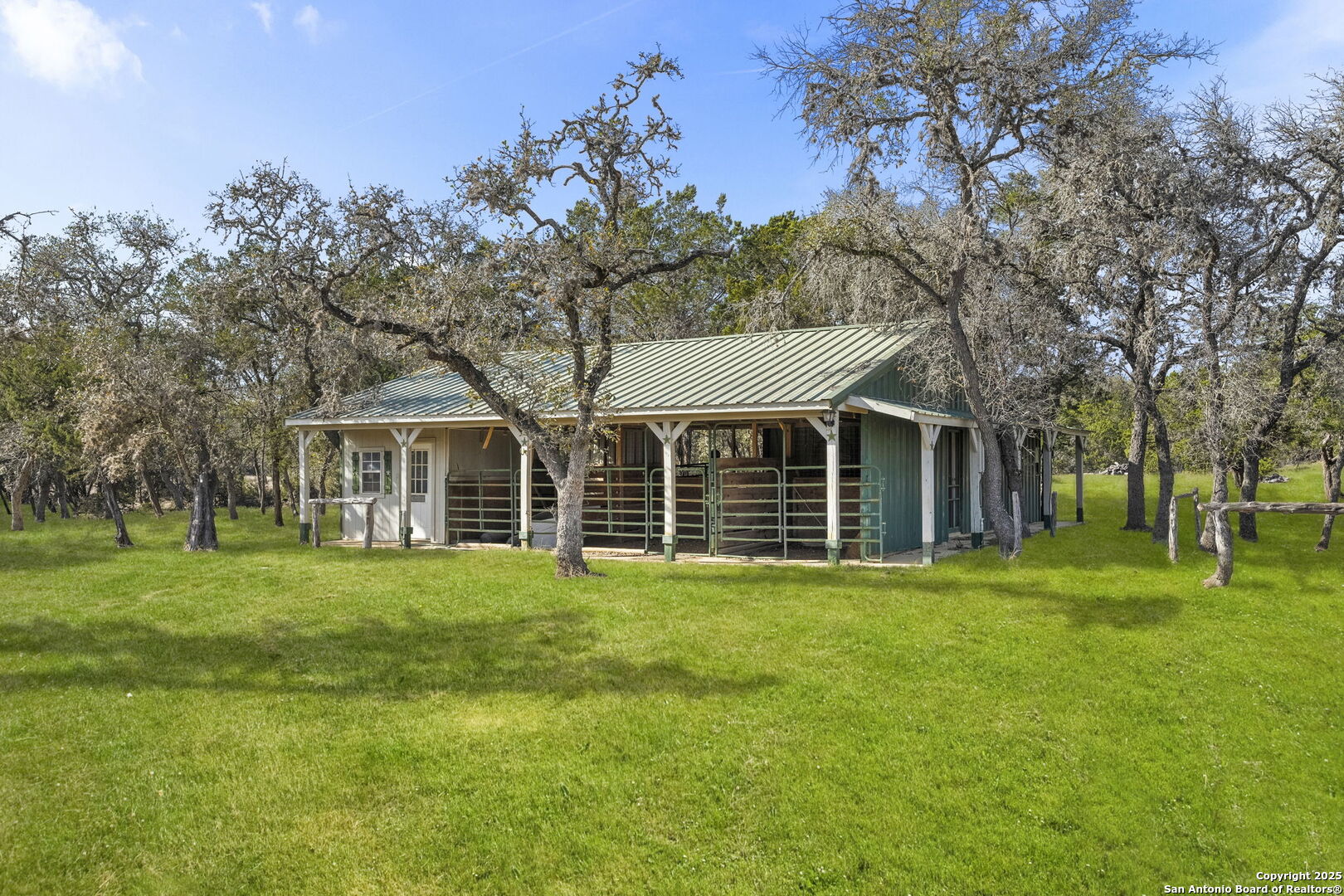 668 Indian Mound Road Tarpley, TX 78883 - Photo 45 of 50 a front view of a house with a garden