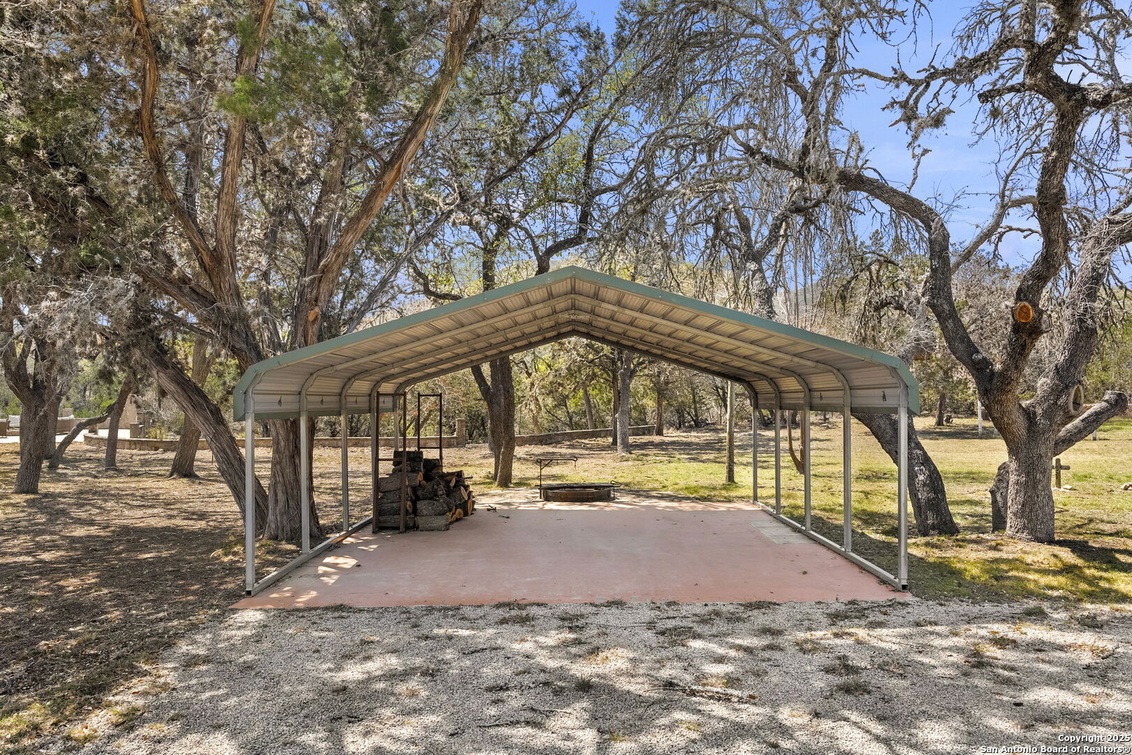 668 Indian Mound Road Tarpley, TX 78883 - Photo 48 of 50 a view of large trees with a yard