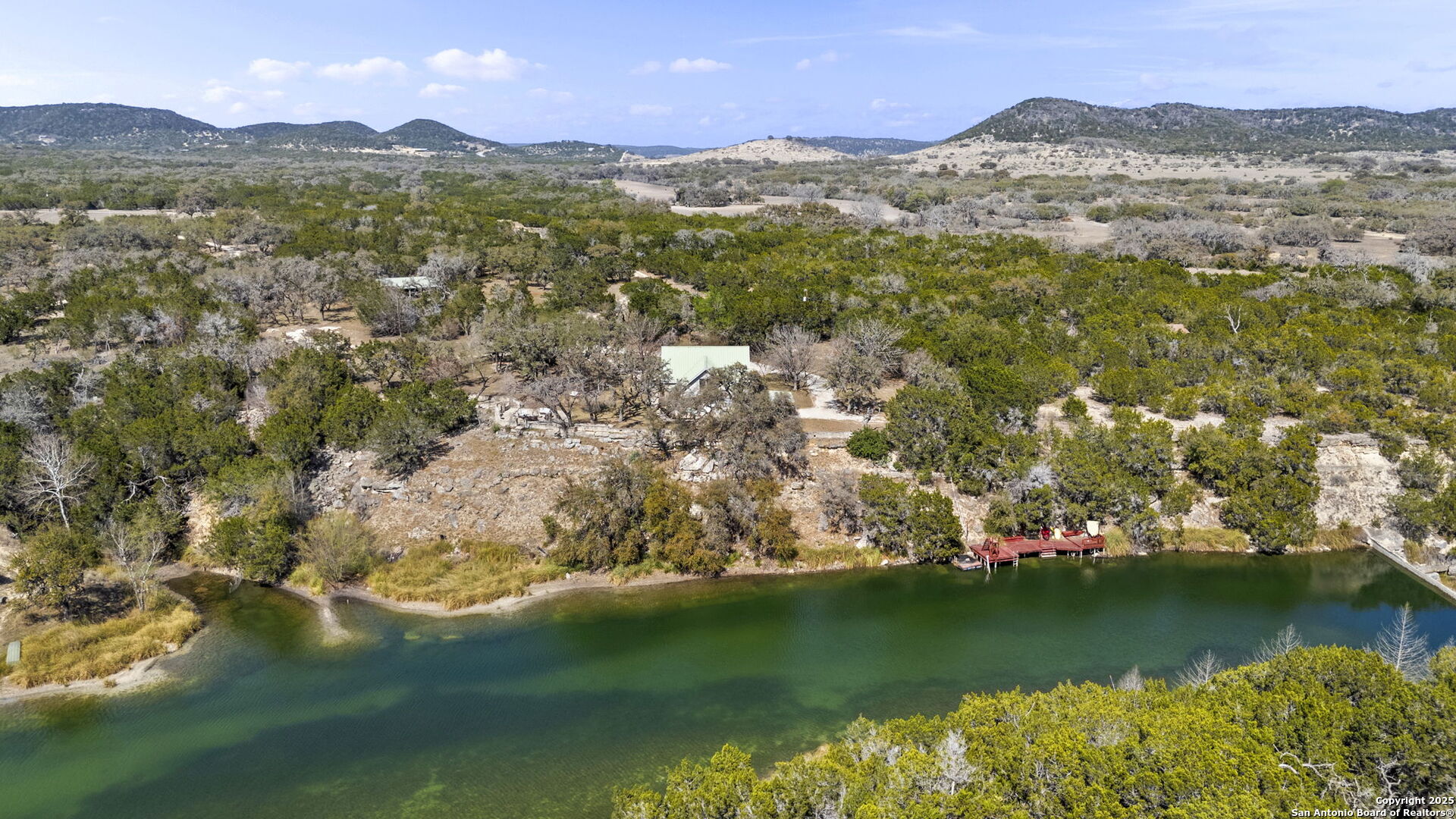 668 Indian Mound Road Tarpley, TX 78883 - Photo 6 of 50 a view of lake with mountain