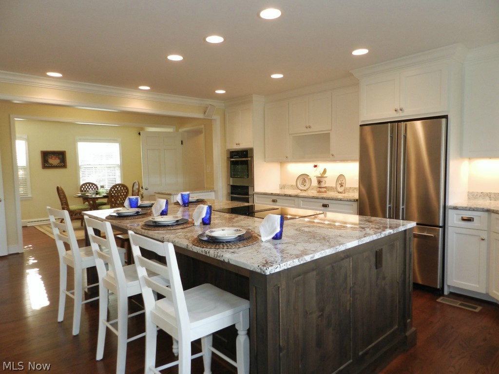 34000 Cedar Road Chagrin Falls, OH 44022 - Photo 4 of 24 The breakfast room to the right offers more eating space. Cabinetry is custom made.