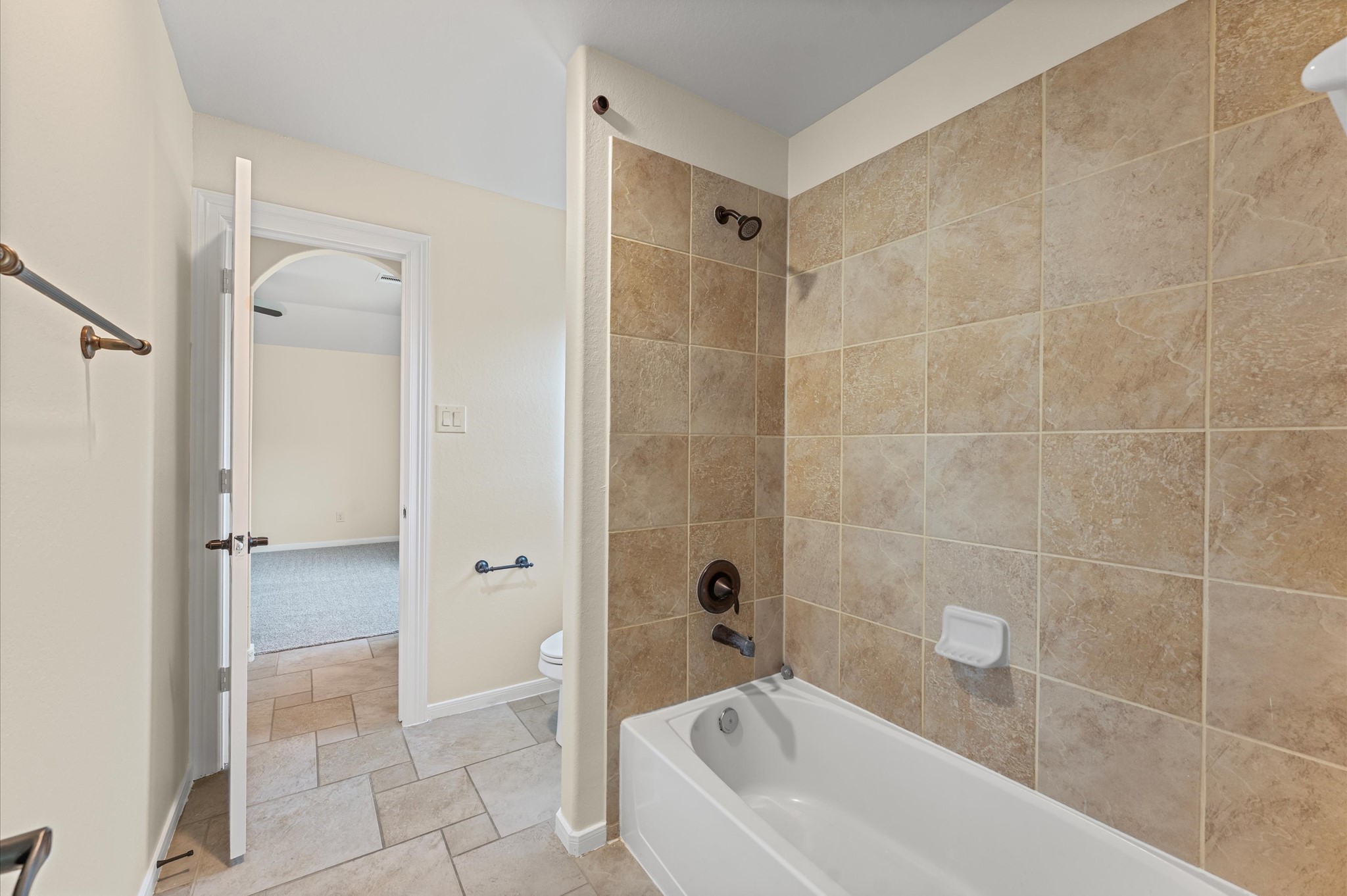 7 North Beech Springs Circle Spring, TX 77389 - Photo 39 of 50 a bathroom with a bathtub and a shower