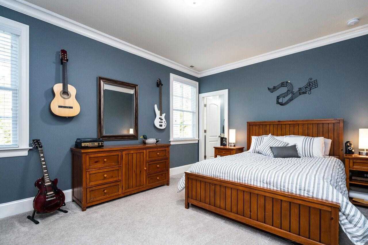8401 Bournemouth Drive Raleigh, NC 27615 - Photo 25 of 41 Bedroom 2 with 9' ceilings, crown, private bath and carpet floors. Bedroom 2