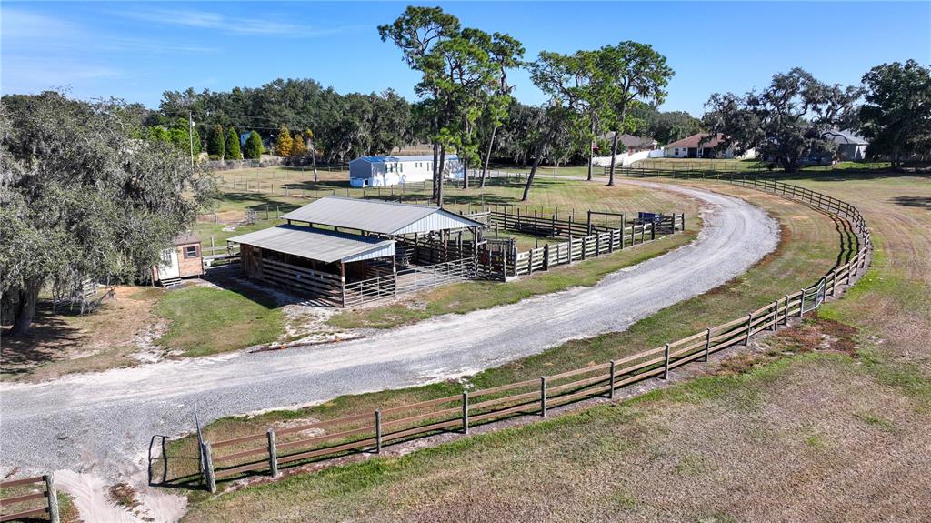 3182 Indian Ridge Place Lakeland, FL 33810 - Photo 12 of 45 a view of a park with large trees