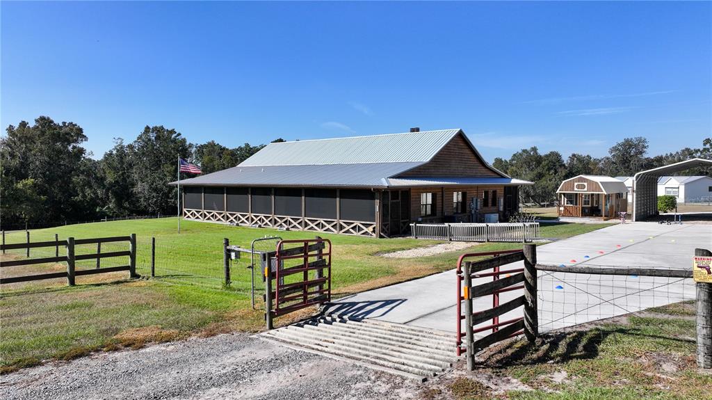 3182 Indian Ridge Place Lakeland, FL 33810 - Photo 15 of 45 a front view of a house with garden