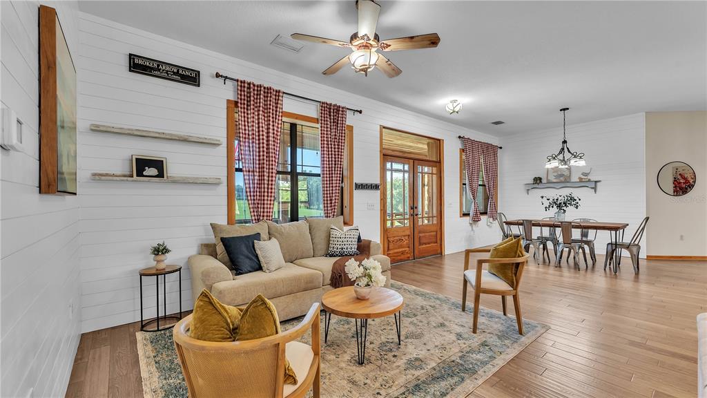 3182 Indian Ridge Place Lakeland, FL 33810 - Photo 30 of 45 a living room with furniture and a large window