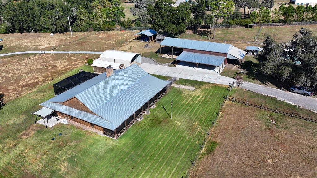 3182 Indian Ridge Place Lakeland, FL 33810 - Photo 3 of 45 a view of a yard with outdoor seating