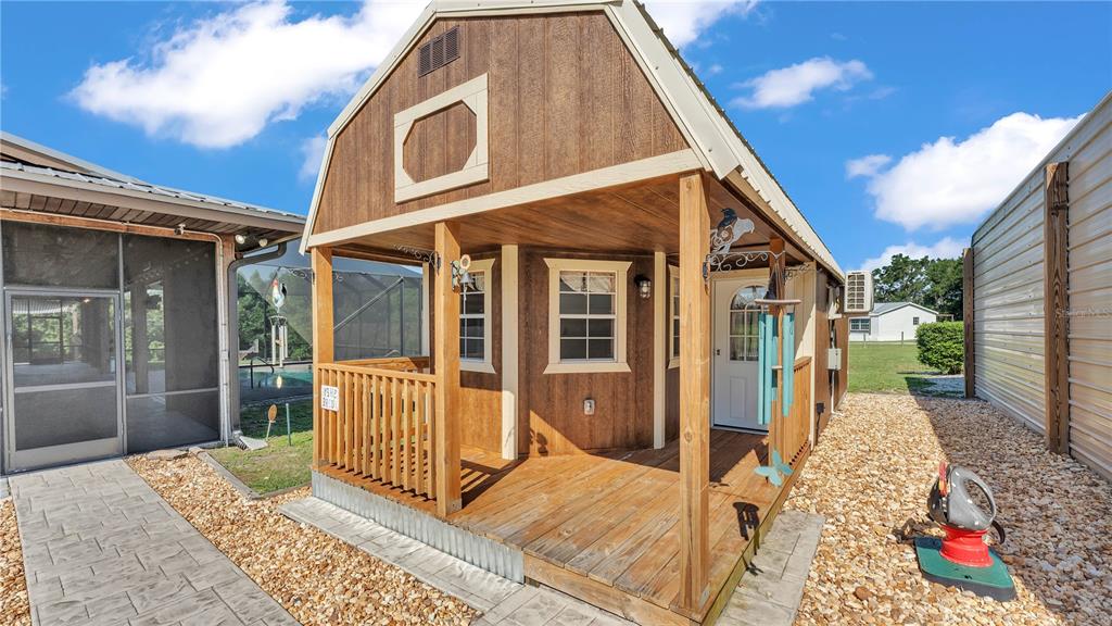 3182 Indian Ridge Place Lakeland, FL 33810 - Photo 43 of 45 a view of a house with wooden fence