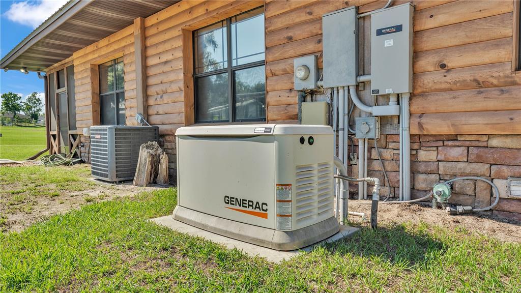 3182 Indian Ridge Place Lakeland, FL 33810 - Photo 44 of 45 a view of a house with a yard