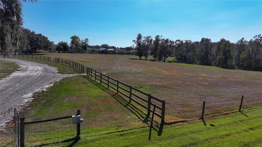 3182 Indian Ridge Place Lakeland, FL 33810 - Photo 8 of 45 a view of a yard with furniture