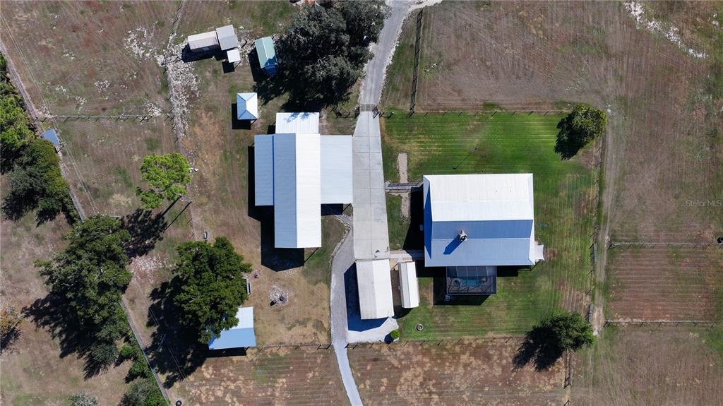 3182 Indian Ridge Place Lakeland, FL 33810 - Photo 10 of 45 an aerial view of houses with outdoor space