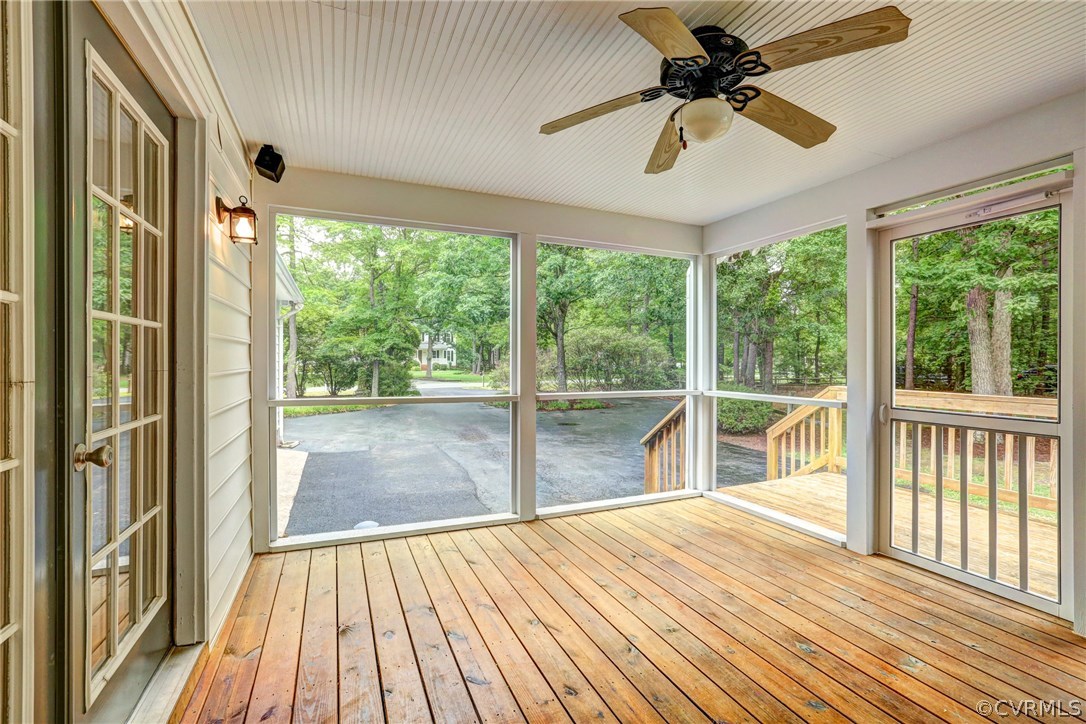 13231 Drakewood Road Midlothian, VA 23113 - Photo 7 of 31 a view of empty room with wooden floor and fan