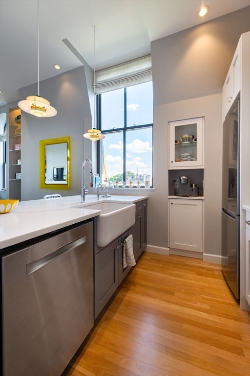130 Appleton Street, Unit 4D Boston, MA 02116 - Photo 14 of 34 a kitchen with stainless steel appliances granite countertop a sink and a refrigerator