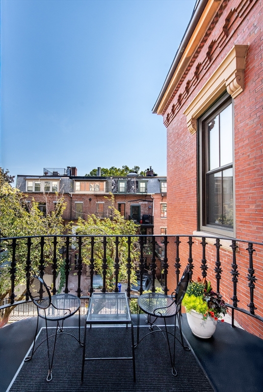 130 Appleton Street, Unit 4D Boston, MA 02116 - Photo 19 of 34 a view of a chairs and table in a patio