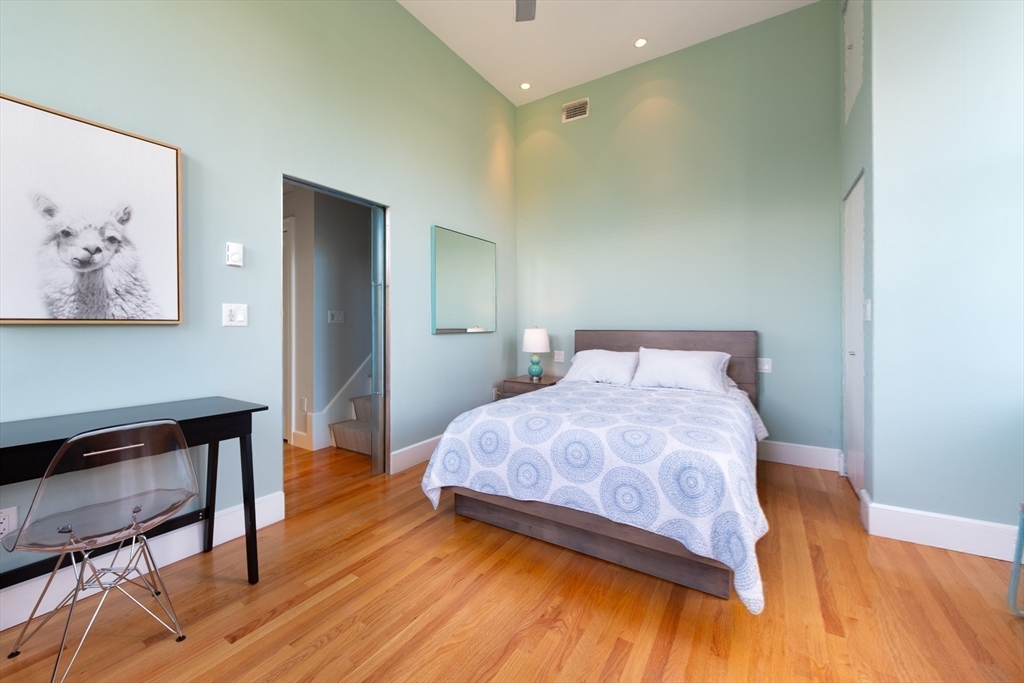 130 Appleton Street, Unit 4D Boston, MA 02116 - Photo 21 of 34 a bedroom with a bed and a desk