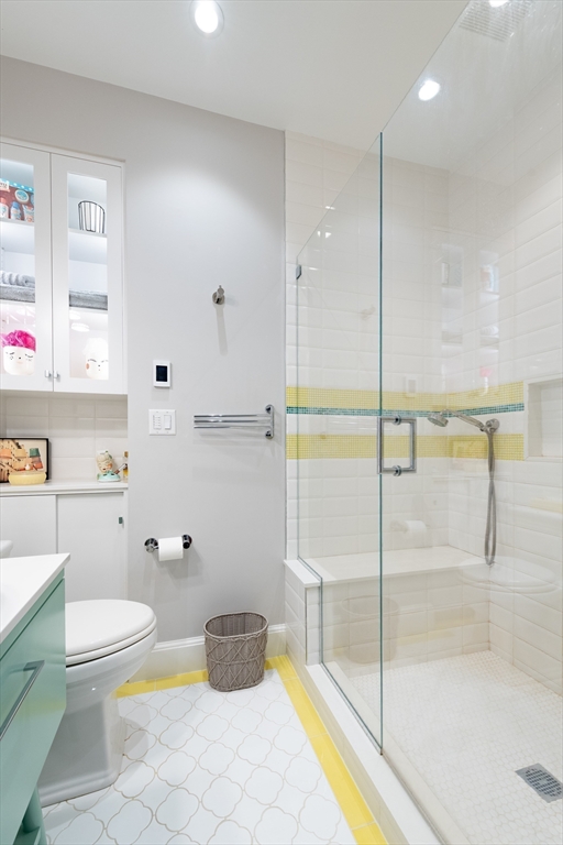 130 Appleton Street, Unit 4D Boston, MA 02116 - Photo 24 of 34 a bathroom with a granite countertop sink a toilet and bathtub