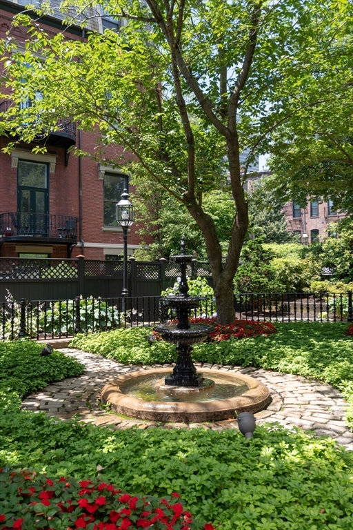 130 Appleton Street, Unit 4D Boston, MA 02116 - Photo 33 of 34 a front view of a house with a yard