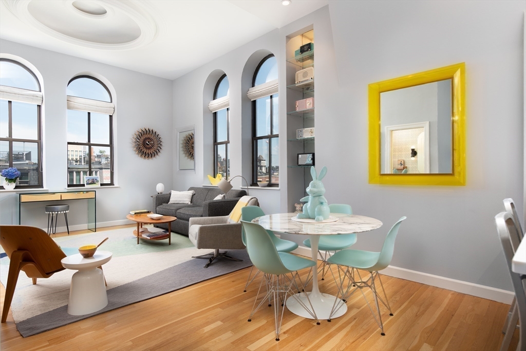 130 Appleton Street, Unit 4D Boston, MA 02116 - Photo 6 of 34 a living room with furniture fireplace and a table