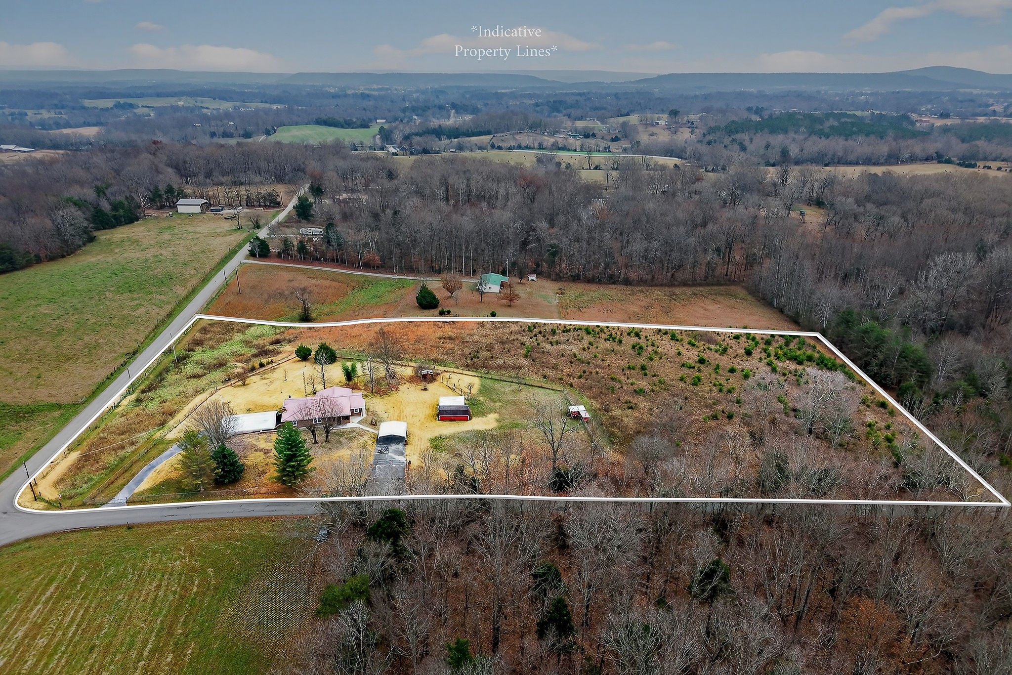 850 Wesley Chapel Road Sparta, TN 38583 - Photo 14 of 68 an aerial view of a house with yard