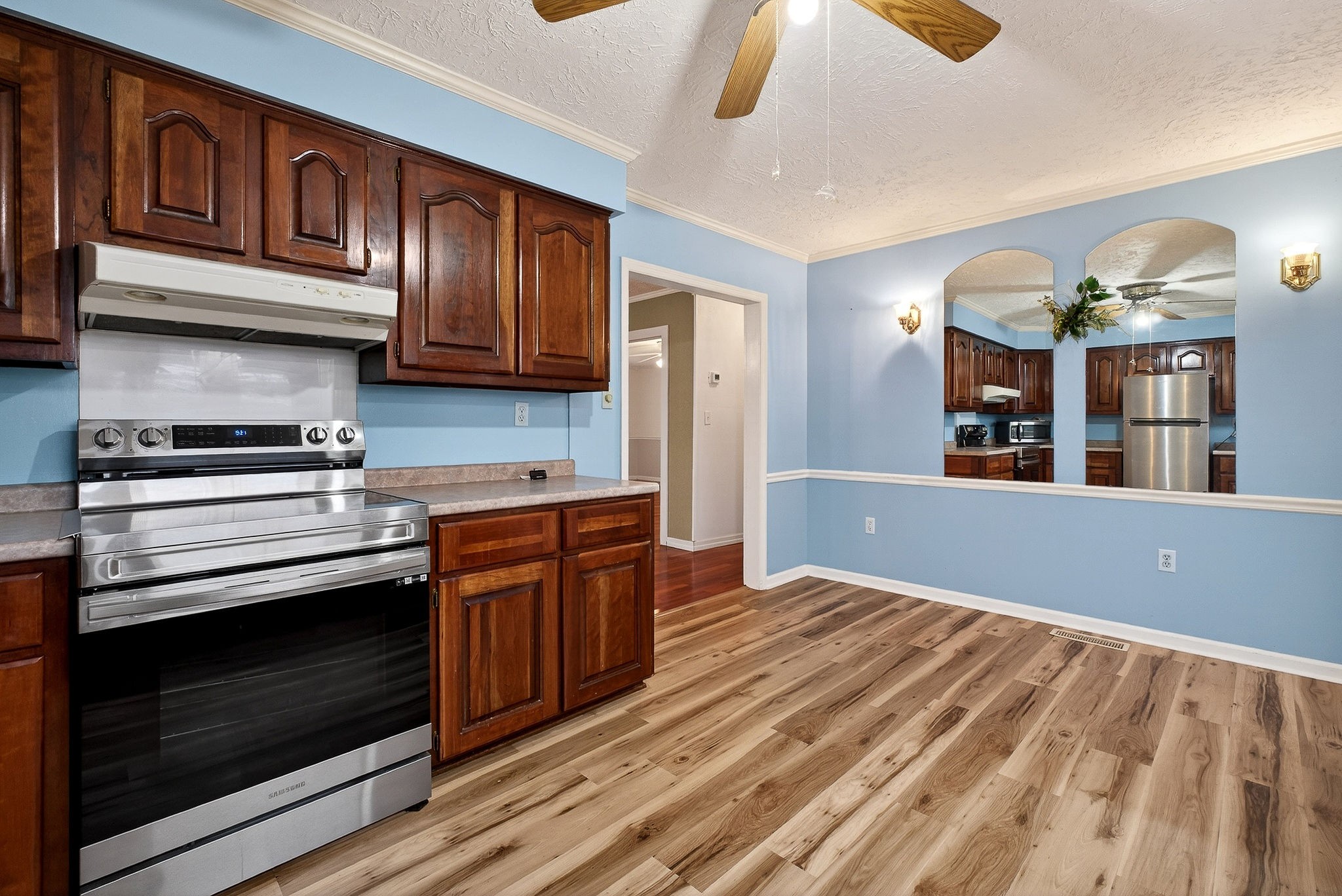850 Wesley Chapel Road Sparta, TN 38583 - Photo 42 of 68 a kitchen with stainless steel appliances granite countertop a stove and cabinets