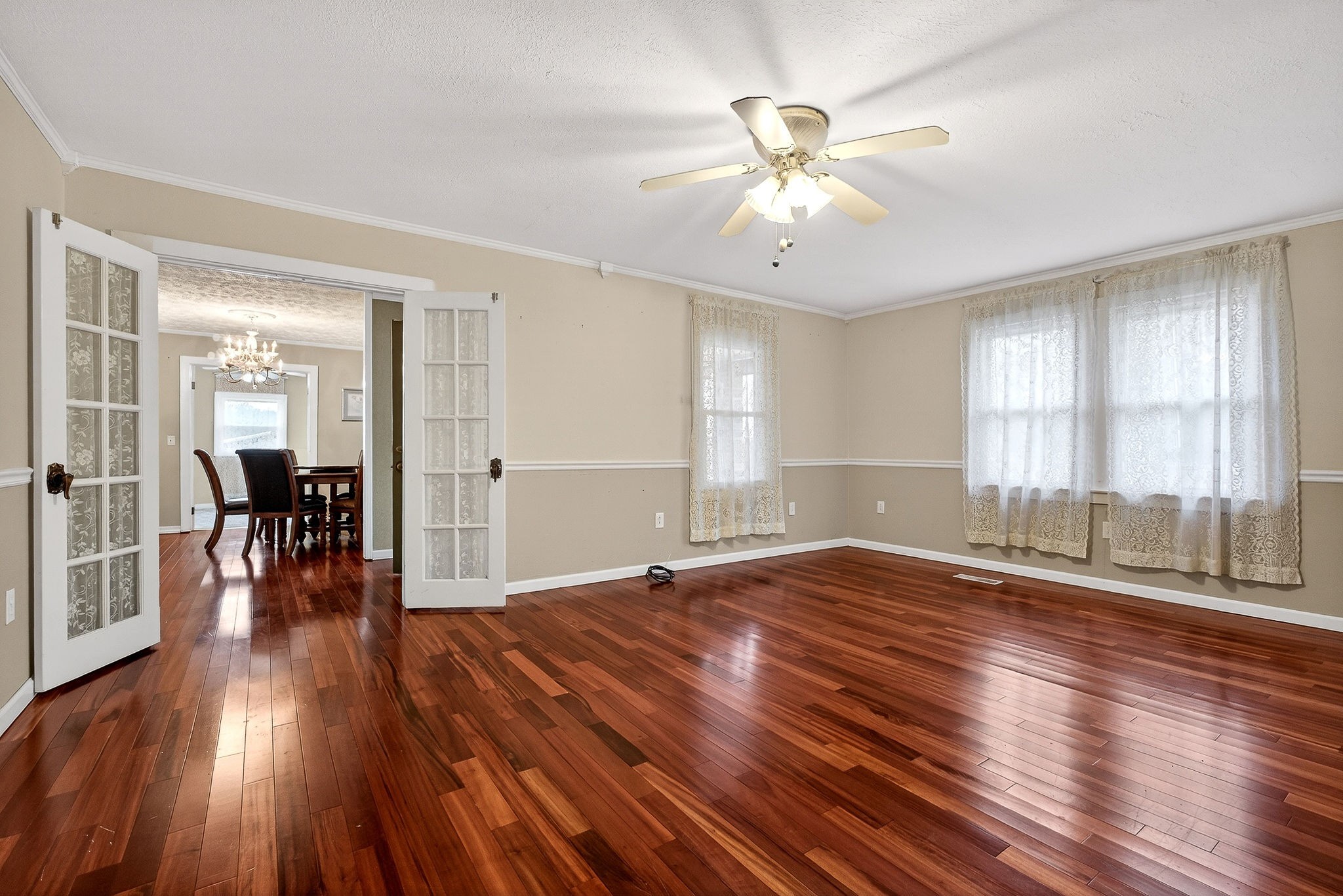 850 Wesley Chapel Road Sparta, TN 38583 - Photo 43 of 68 wooden floor in an empty room with a window