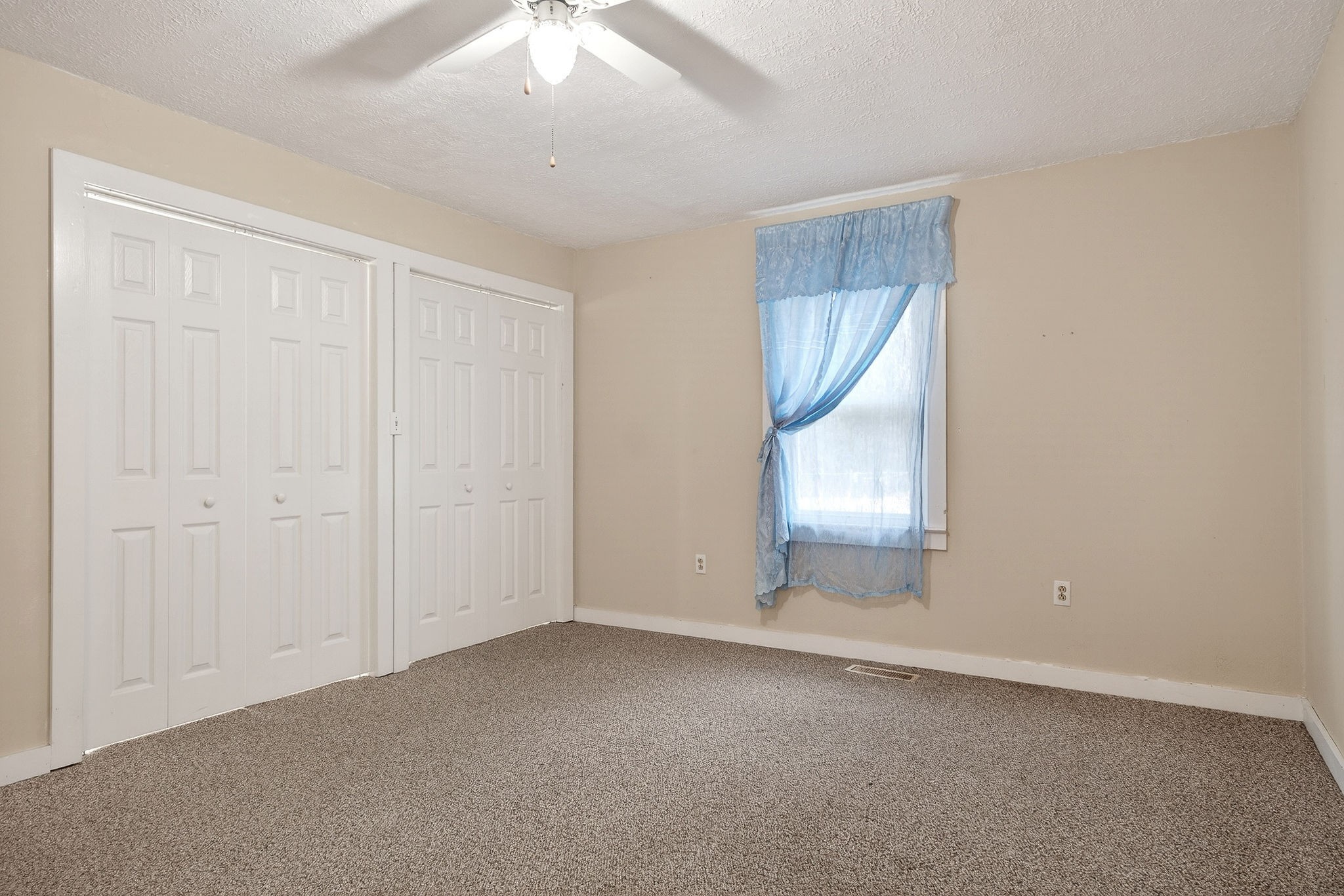 850 Wesley Chapel Road Sparta, TN 38583 - Photo 51 of 68 an empty room with a empty space and windows