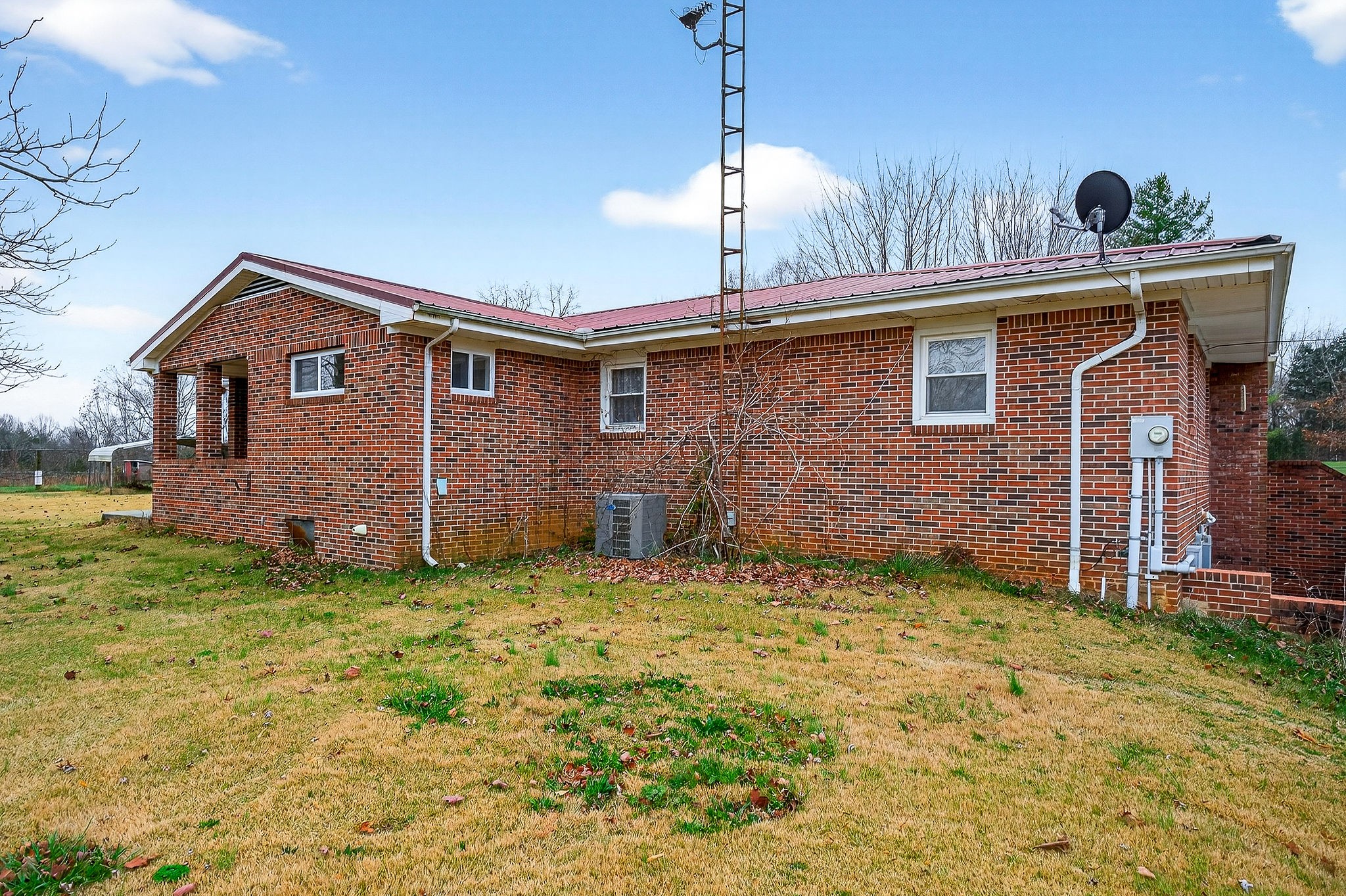 850 Wesley Chapel Road Sparta, TN 38583 - Photo 54 of 68 a front view of a house with a yard