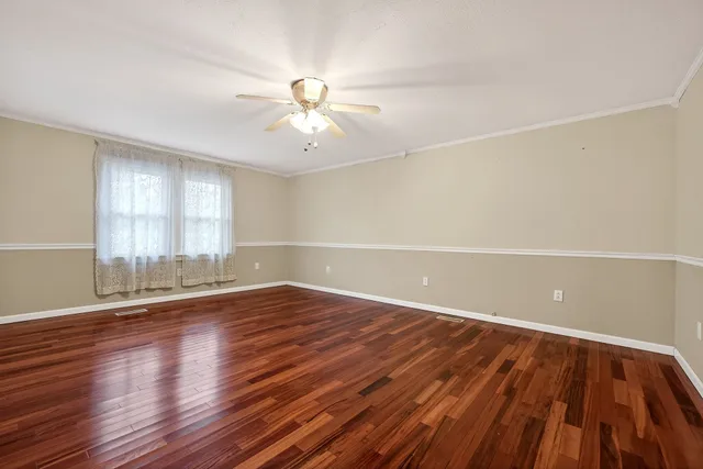 a view of a car park in front of house