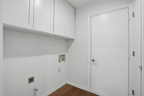 a view of small space with wooden floor