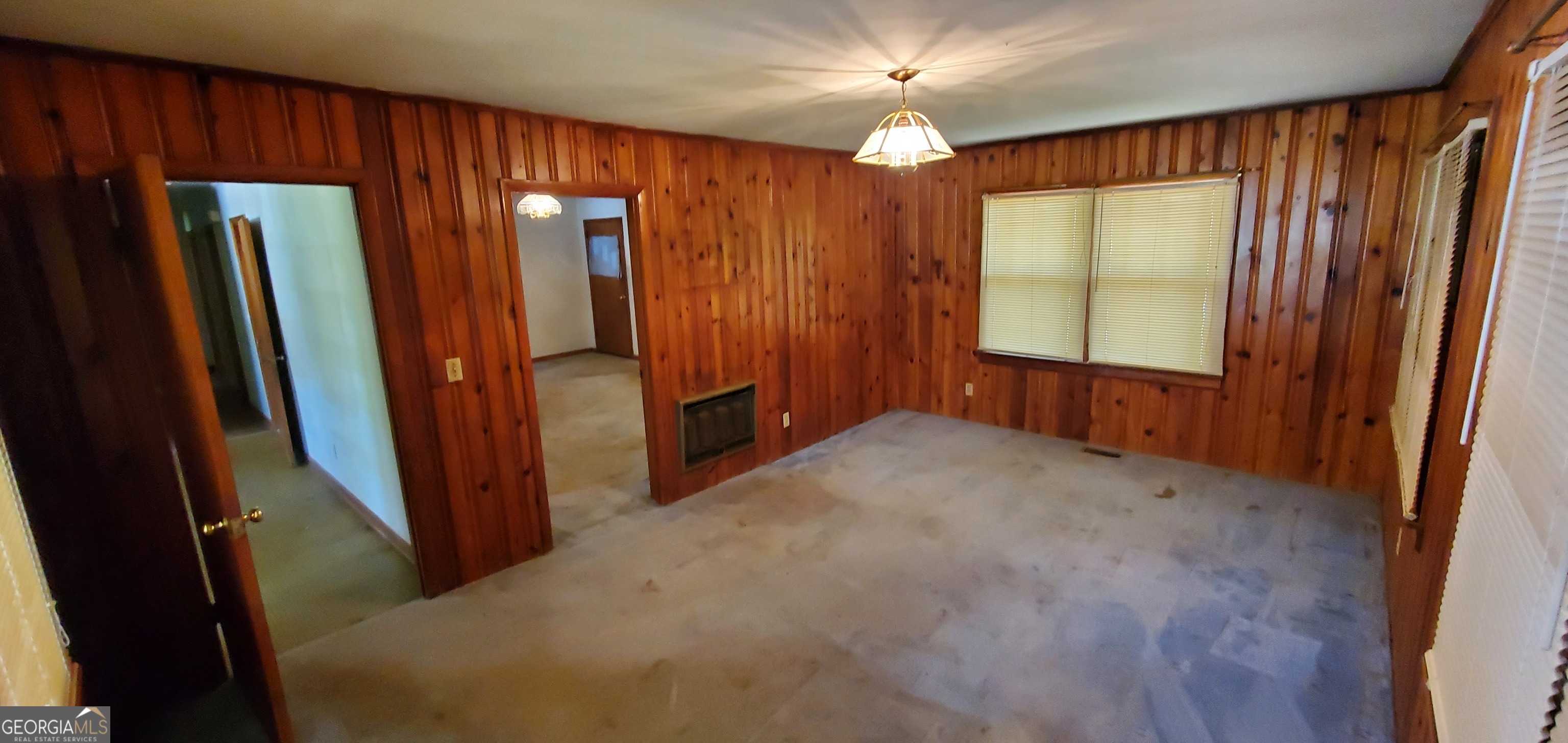 1061 Burger Road Watkinsville, GA 30677 - Photo 7 of 43 wooden floor in an empty room with a window