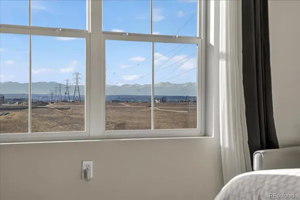 a view of an empty room and window