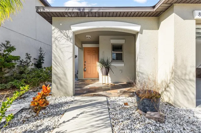 a front view of a house with a porch