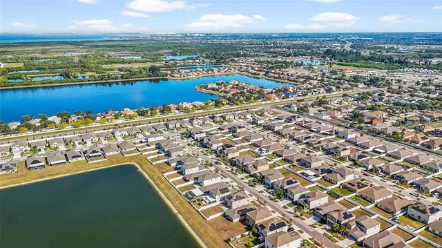 a view of a city with an ocean view
