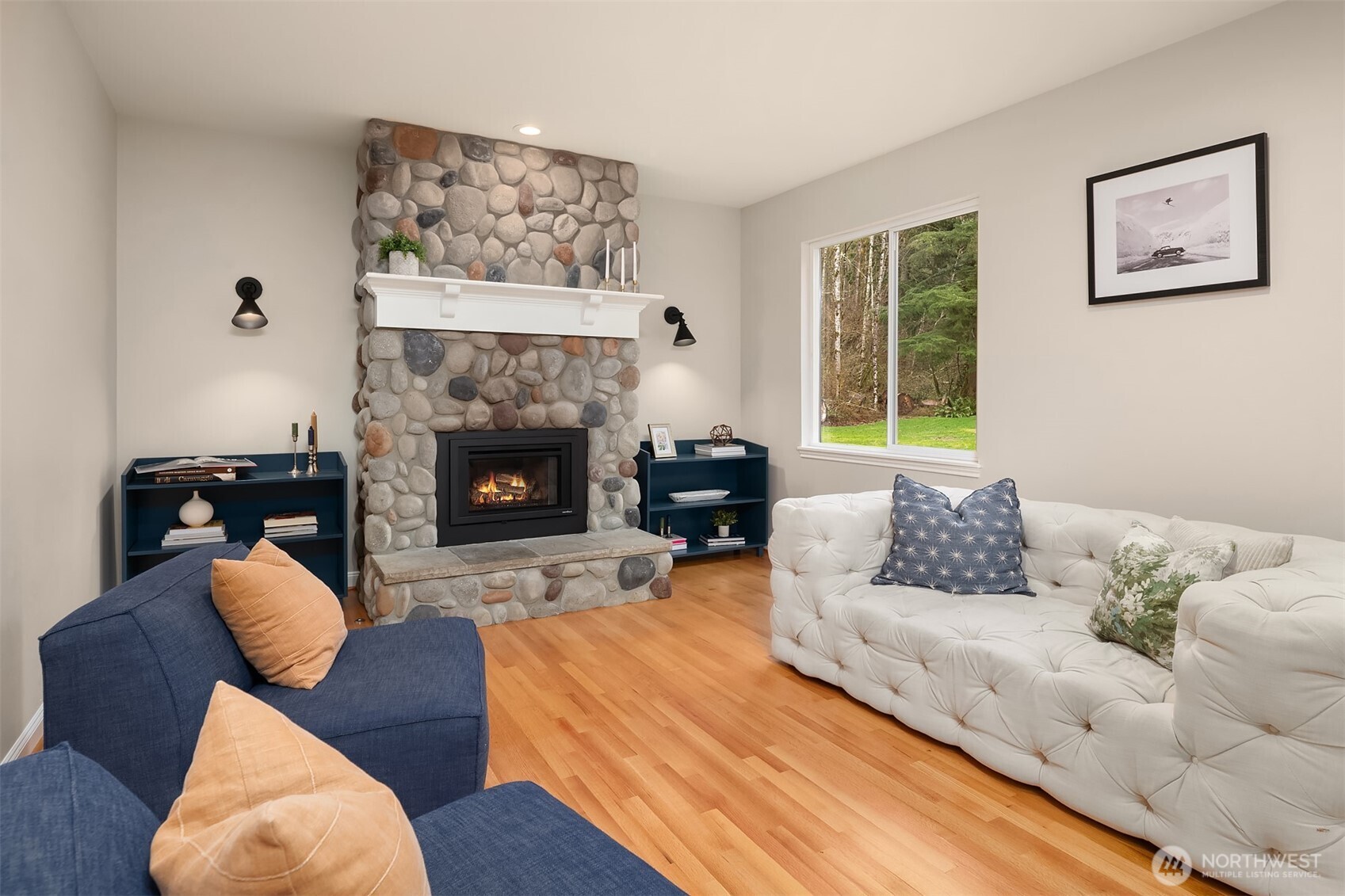47419 Southeast 157th Place North Bend, WA 98045 - Photo 13 of 39 a living room with furniture and a fireplace
