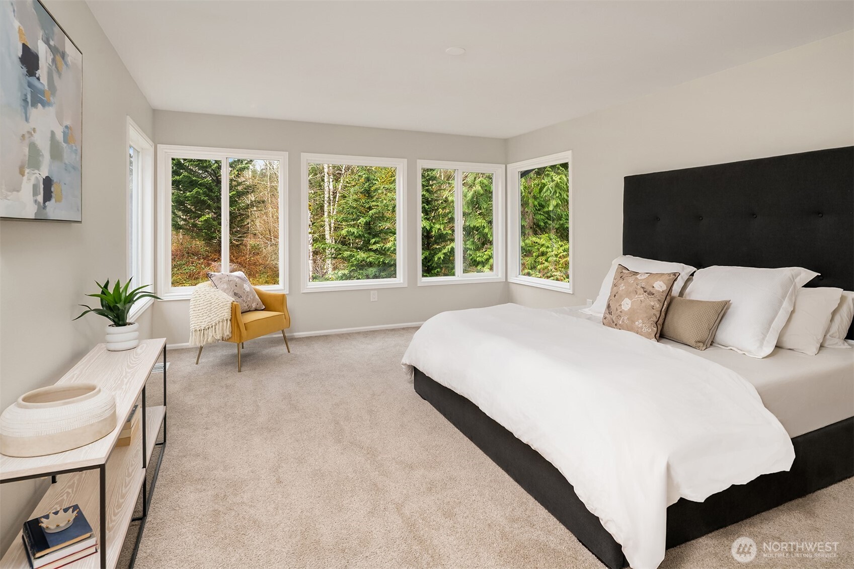 47419 Southeast 157th Place North Bend, WA 98045 - Photo 26 of 39 a spacious bedroom with a bed and a couch