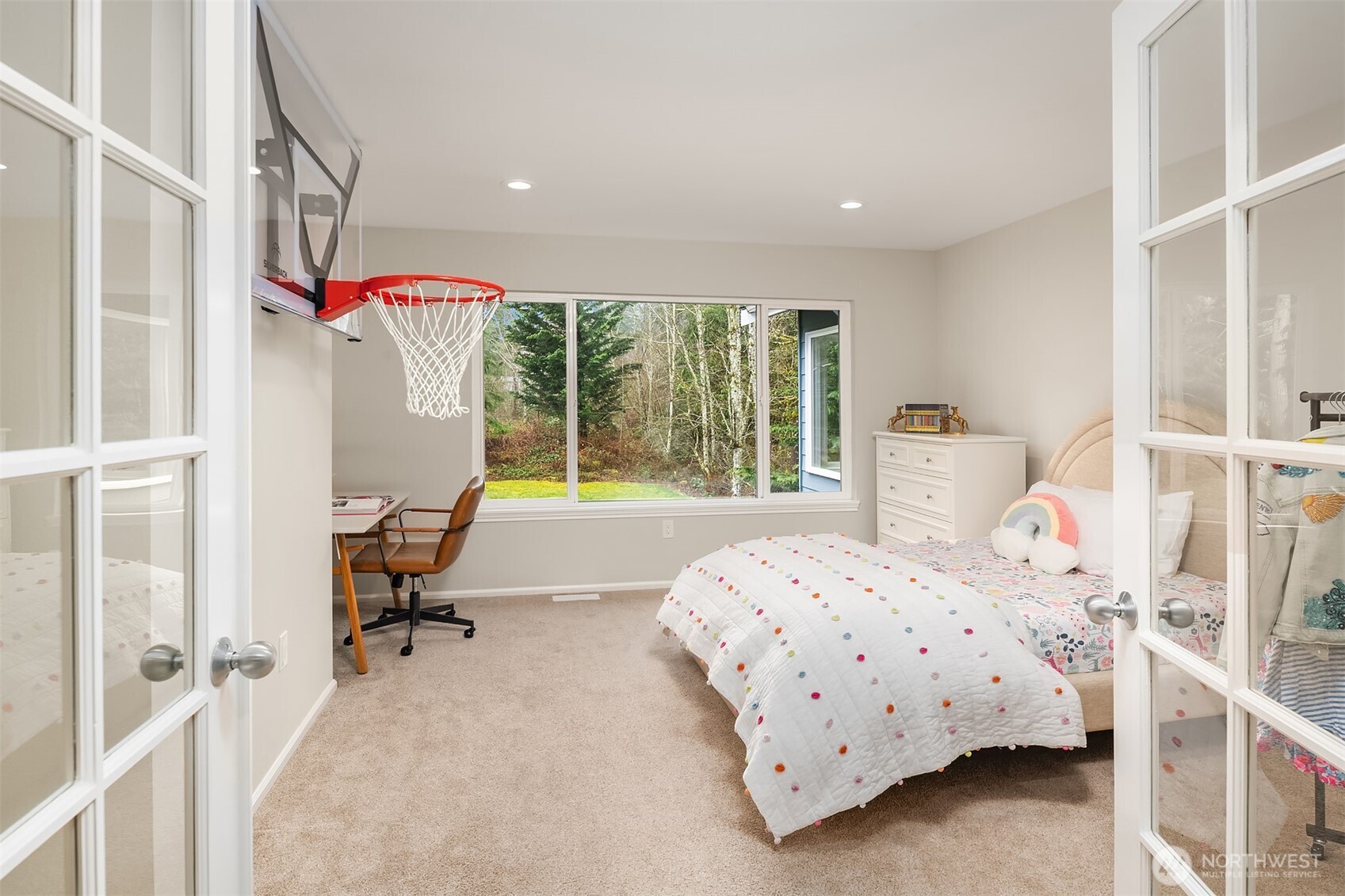 47419 Southeast 157th Place North Bend, WA 98045 - Photo 29 of 39 a bedroom with a bed and a large window