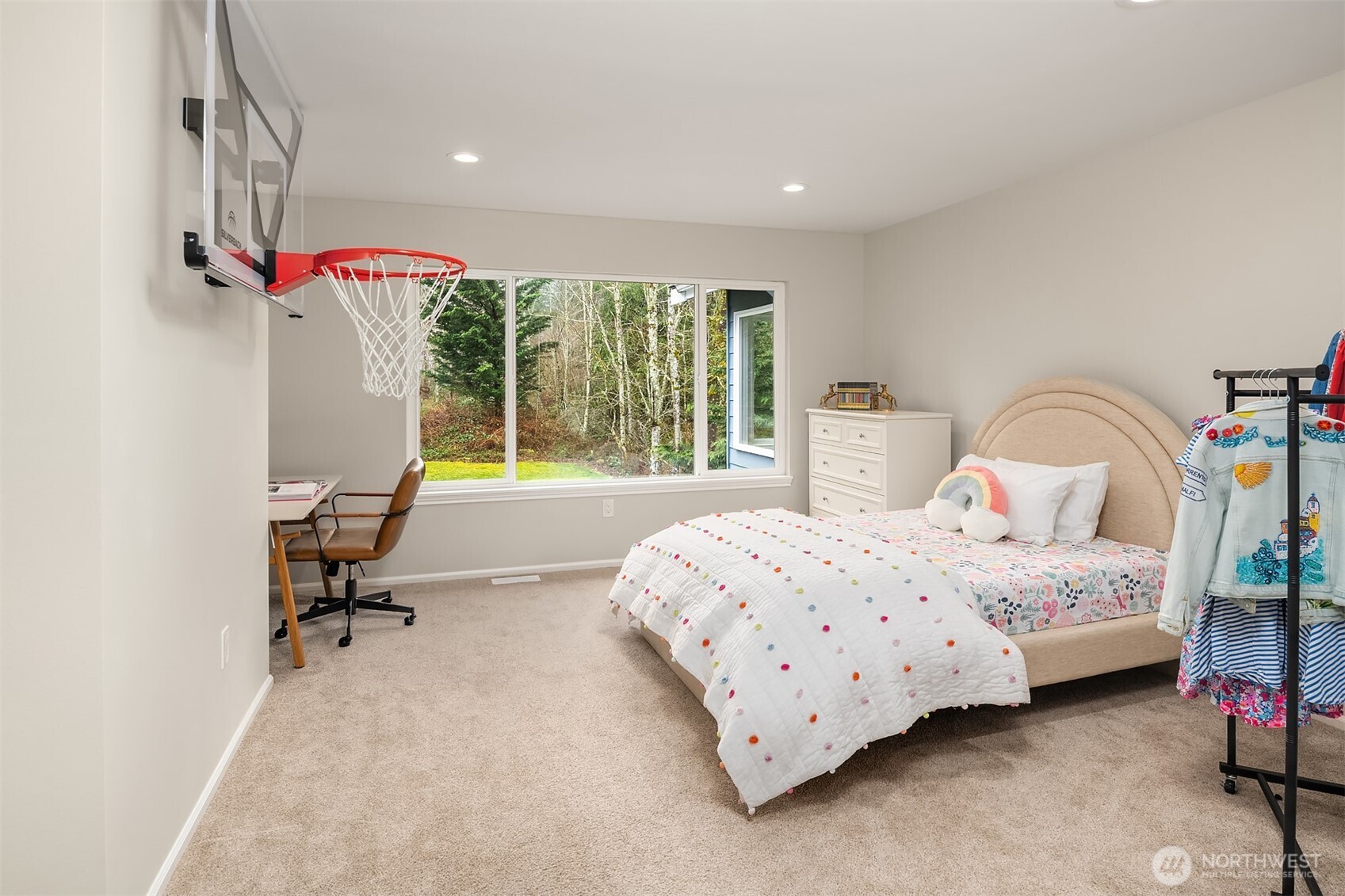 47419 Southeast 157th Place North Bend, WA 98045 - Photo 30 of 39 a bedroom with a bed and a large window