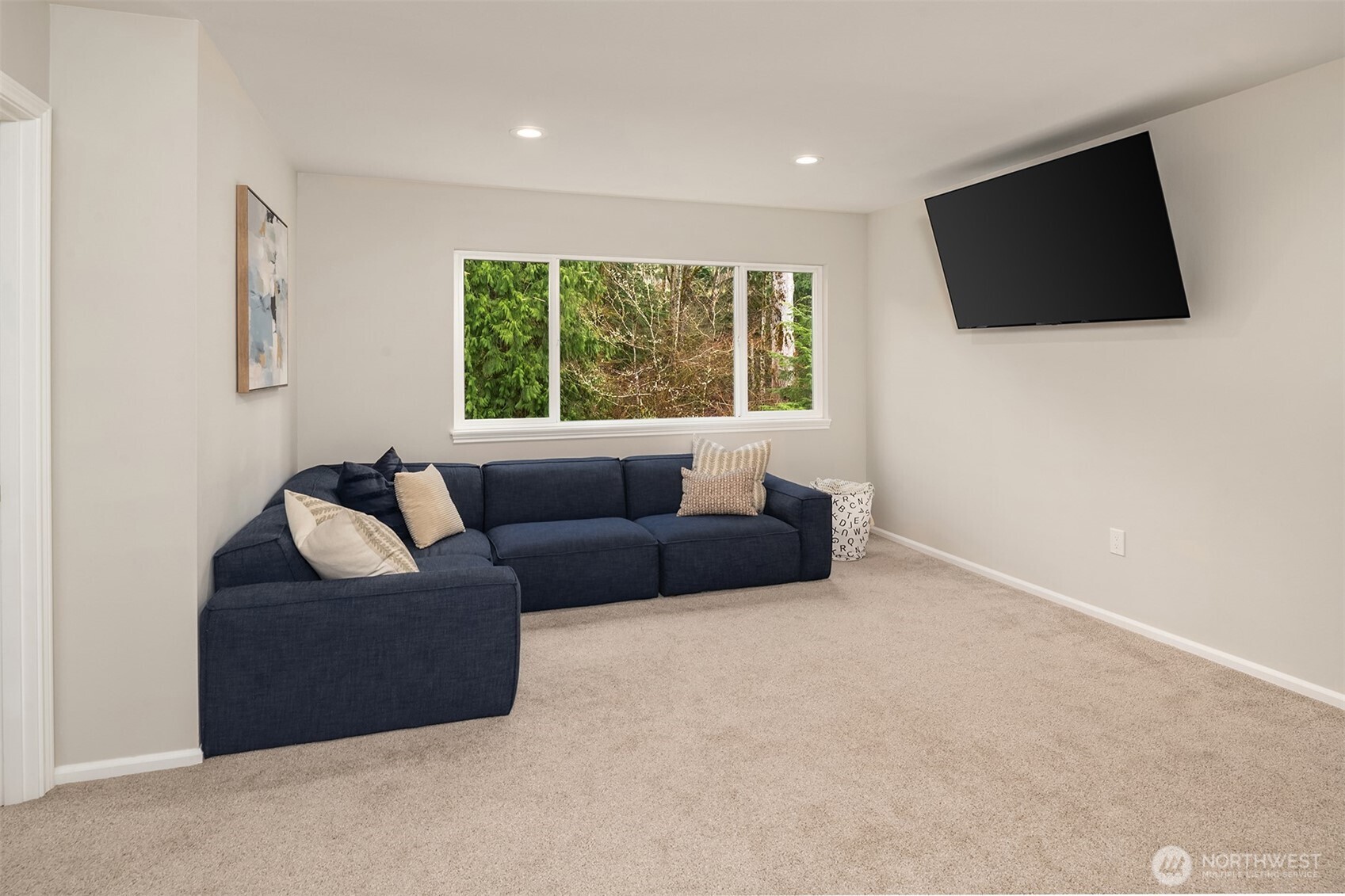 47419 Southeast 157th Place North Bend, WA 98045 - Photo 34 of 39 a living room with furniture and a flat screen tv