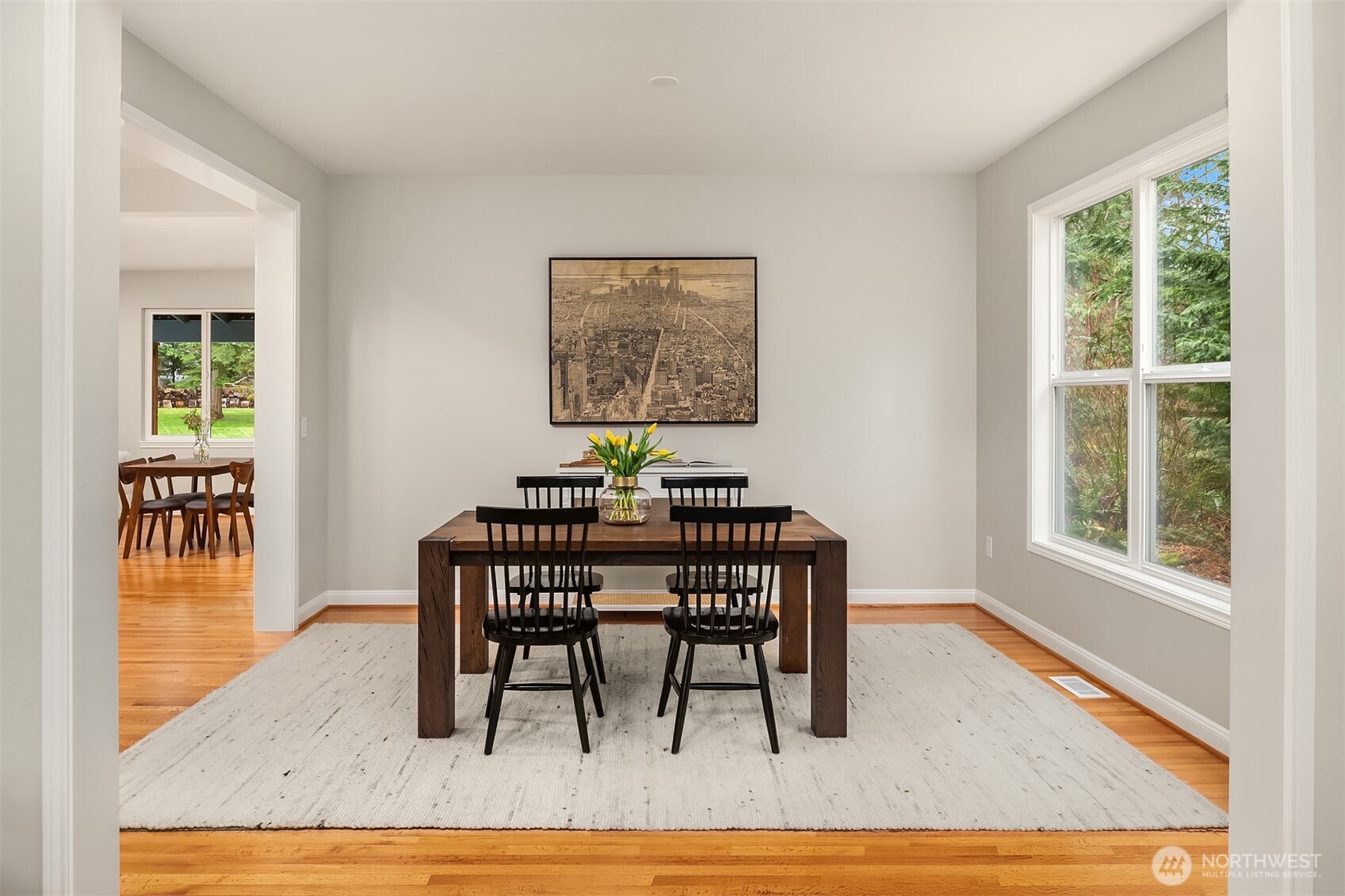 47419 Southeast 157th Place North Bend, WA 98045 - Photo 10 of 39 a view of a dining room with furniture and wooden floor