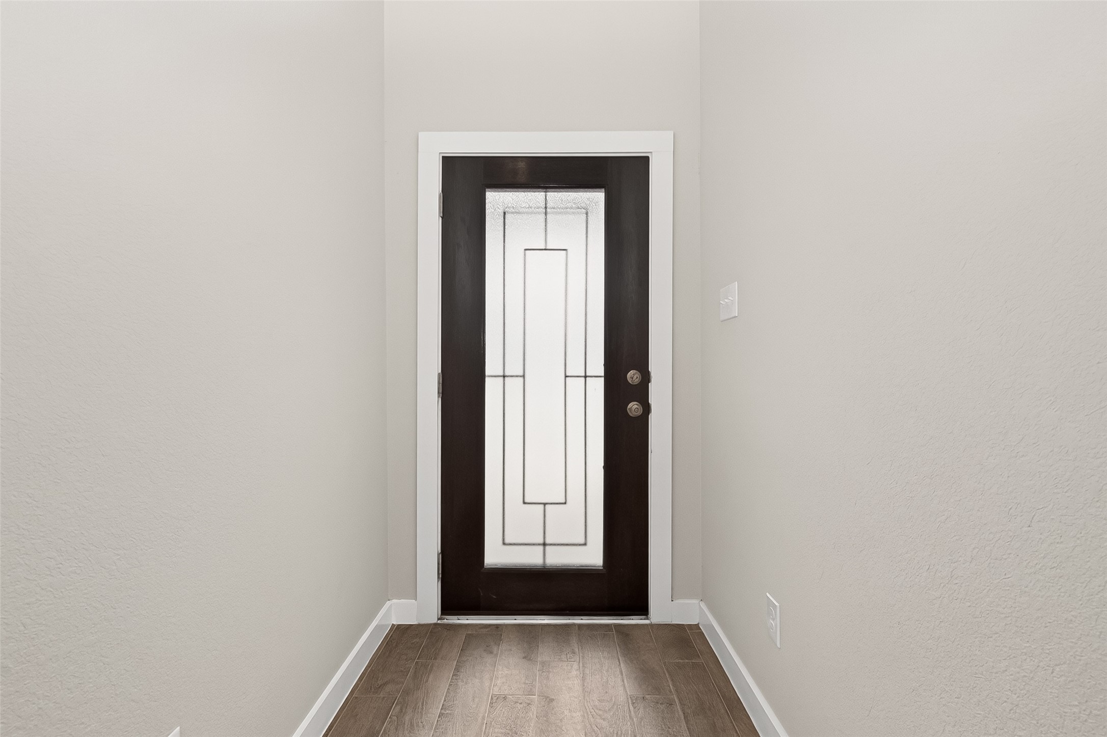 2142 Reed Cave Lane Spring, TX 77386 - Photo 4 of 50 a view of an empty room with wooden floor and a window