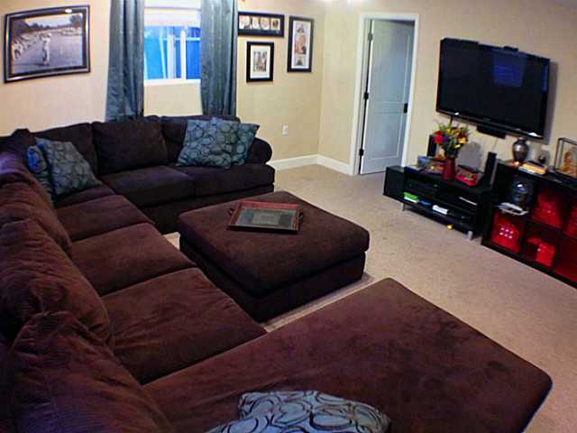 9743 Vomac Road Santee, CA 92071 - Photo 8 of 21 Another view of the Family room. Notice how long that sectional is.