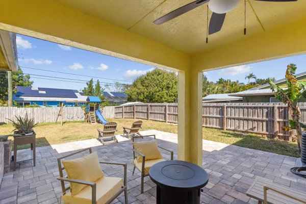 a view of a swimming pool with a patio