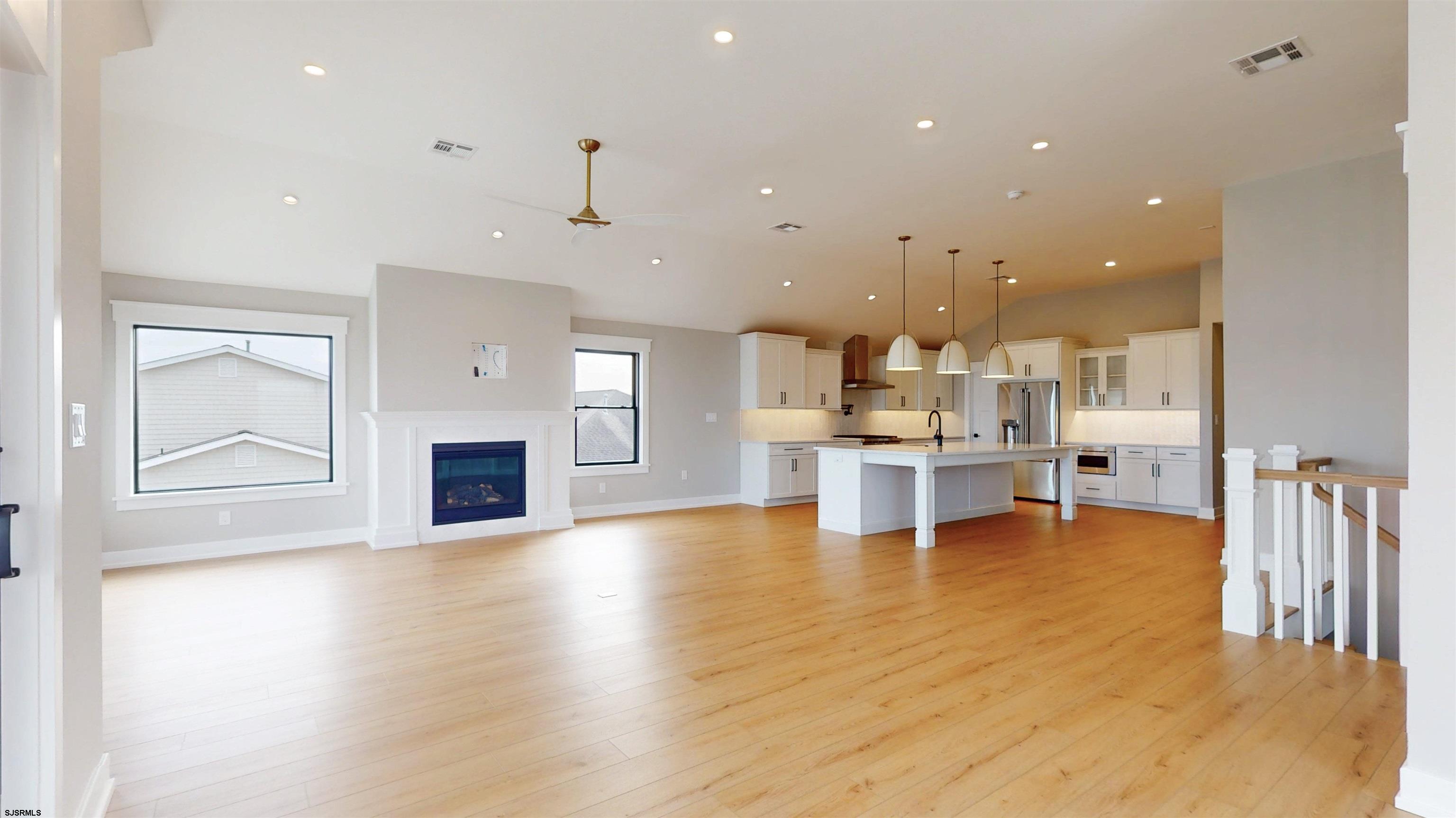 204 12th Street South Brigantine, NJ 08203 - Photo 12 of 63 a view of kitchen with furniture and wooden floor