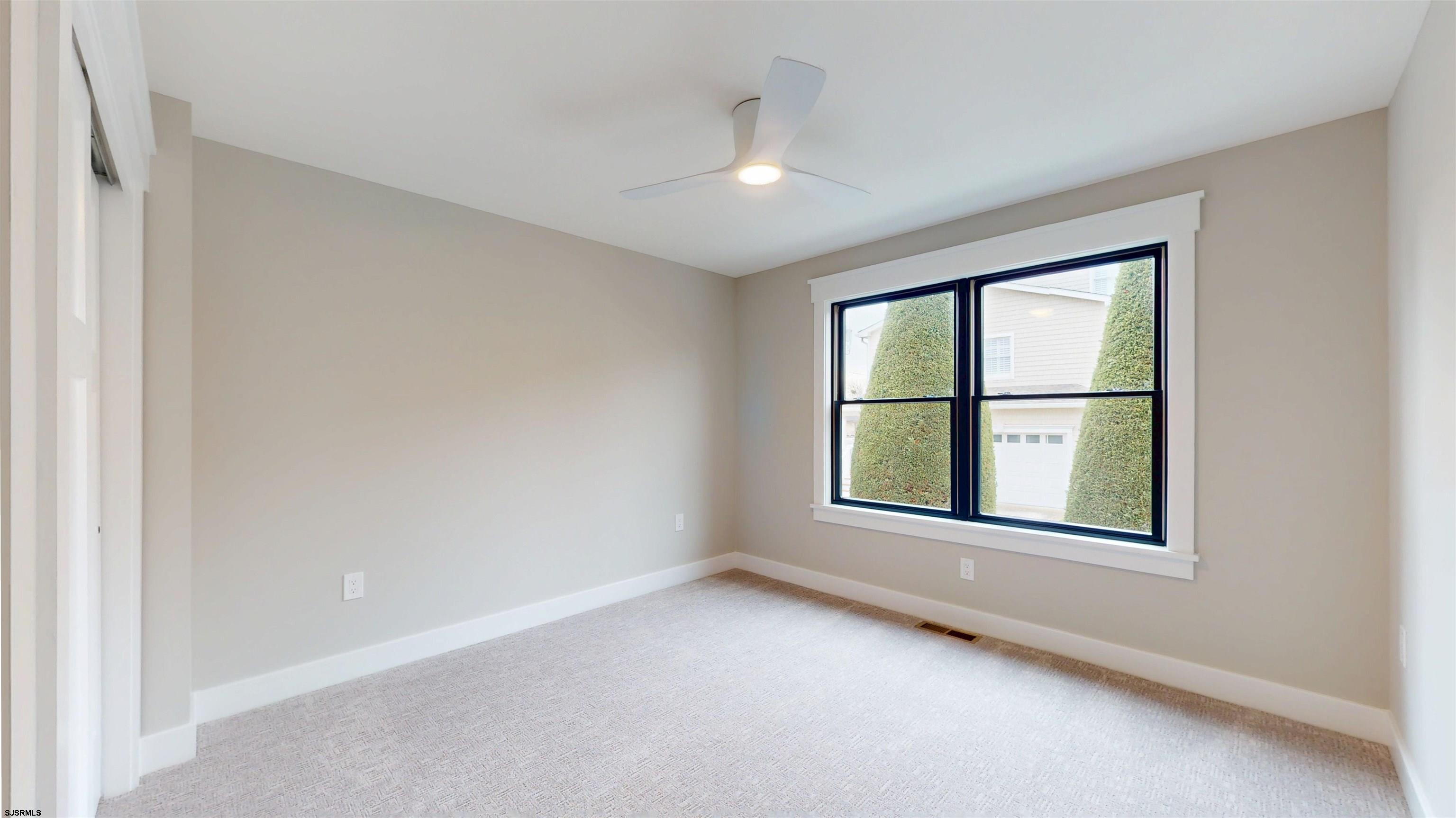 204 12th Street South Brigantine, NJ 08203 - Photo 38 of 63 an empty room with a window