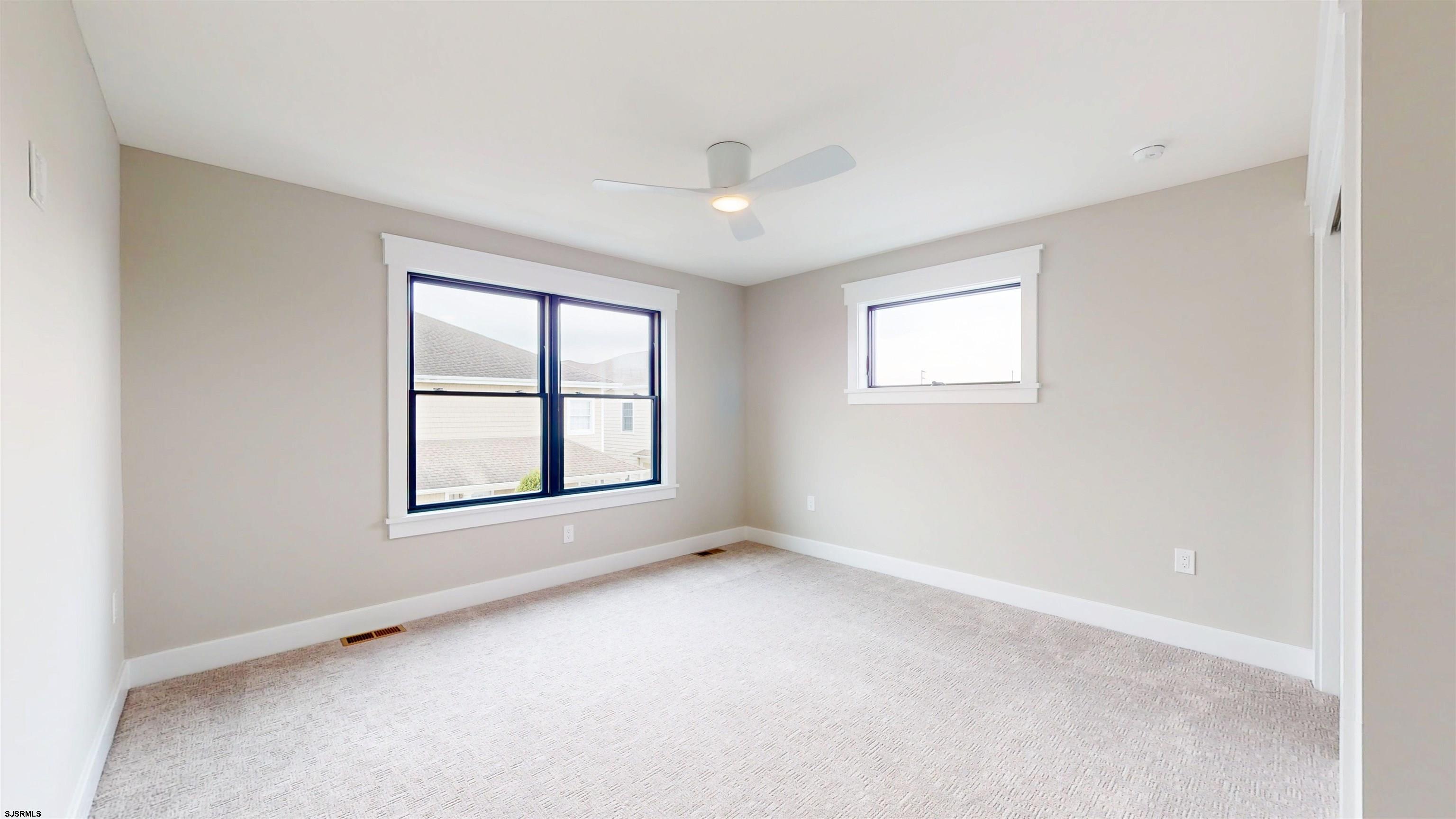 204 12th Street South Brigantine, NJ 08203 - Photo 42 of 63 an empty room with a window