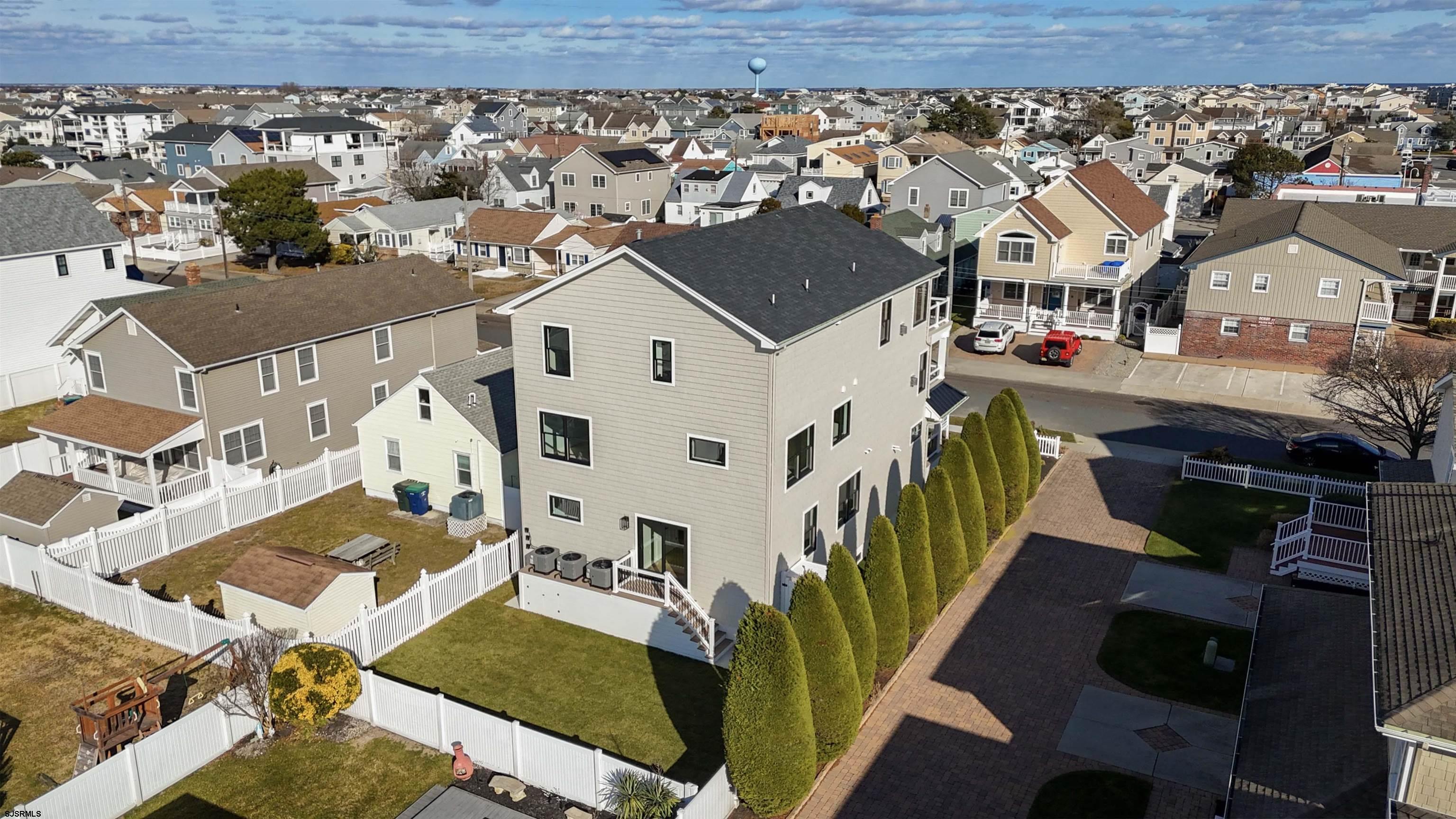 204 12th Street South Brigantine, NJ 08203 - Photo 62 of 63 an aerial view of residential houses with outdoor space