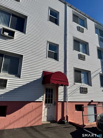 a front view of a house with a balcony